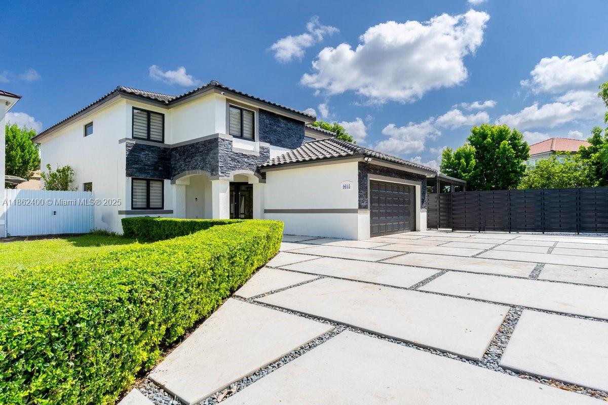 Welcome to your dream home! This beautifully remodeled 4-bedroom home has been upgraded to perfection just three years ago. Featuring a brand-new roof, impact windows, new interior doors, and brand-new bathrooms, this home offers both safety and style. The interior also includes sleek new flooring and a convenient bedroom with a full bathroom on the ground floor.
The outdoor space is an entertainer’s paradise with a completely redone pool that includes a jacuzzi, plus a brand-new outdoor kitchen. The property also features a new concrete driveway and new metal fence, enhancing both curb appeal and privacy.
Don’t miss out on this incredible opportunity to own a turnkey property that combines luxury and comfort!