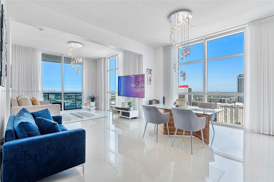 Spectacular, spacious home in the sky with astounding ocean and city views.  Serene wide water and tropical sunset views are captured from floor to ceiling windows throughout.  Soaring ceilings, split floor plan, and gorgeous multiple balconies offer the best views SOFLO has to offer. Watch the yachts sail by and the dolpins swim from this luxe move in ready designer finished tower suite. This gorgeous true 3 bedroom offers privacy and luxury with captivating views from every window. En suite bedrooms, walk in closets, and private corner with open living concept make this amazing oasis your spa like home. Enjoy resort style amenities like a sauna, billiards, cabanas, gym, business center, and more! An absolute one of a kind residence.