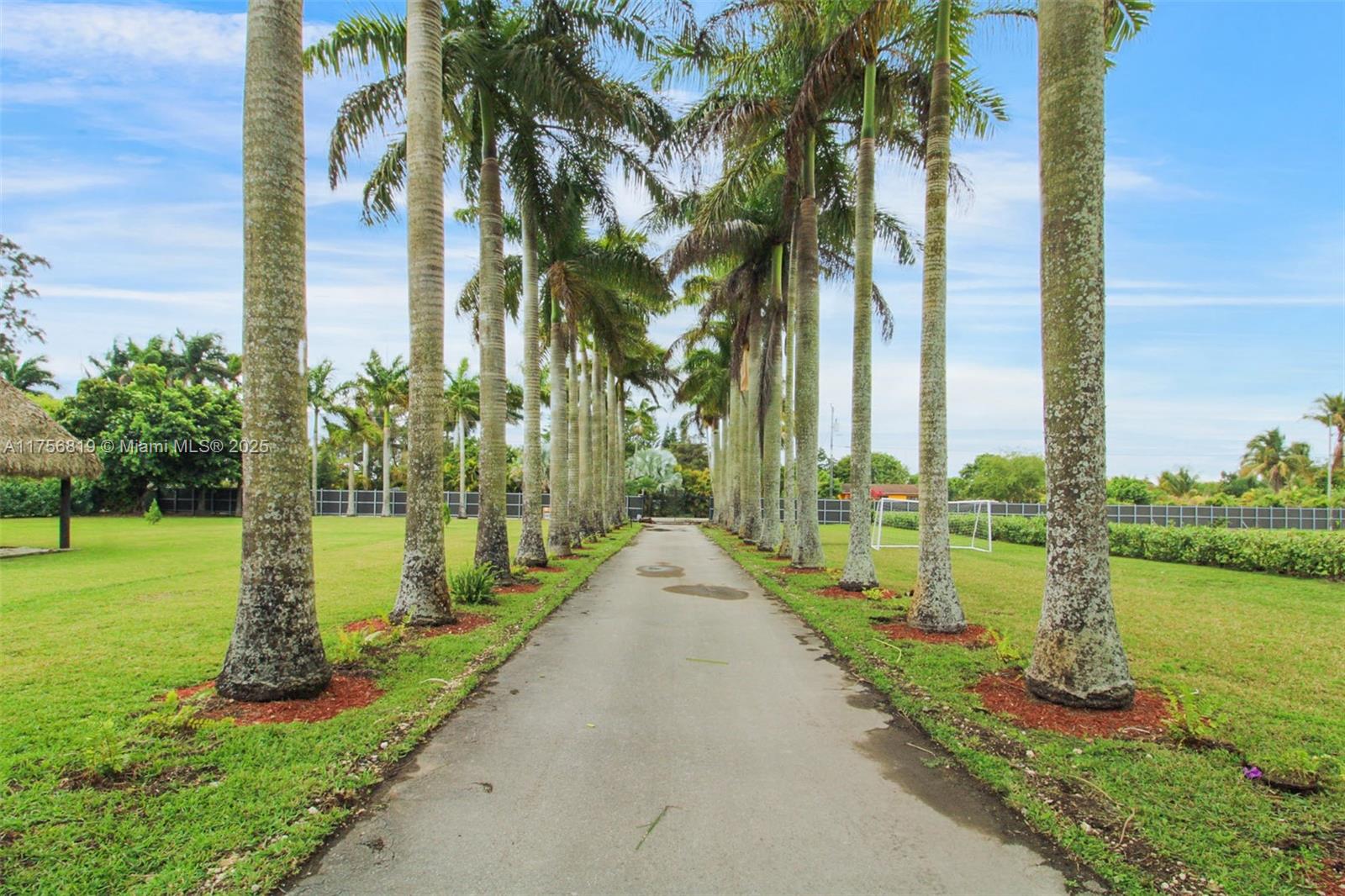 SPECTACULAR LAND! Located in a rapidly developing area, this property has immense potential for future growth and development. 5 acres of beautiful developed land in West Kendall, an opportunity full of potential, you are greeted by an entrance with palm tree-lined paths, this versatile property is designed for a variety of housing or business ideas: an event venue, from a country restaurant, a horse stable, crops of different fruits or plants. Sprinklers systems,two septic tanks,electrical,24-hour camera system,2 electric gates,This beautiful land has 6 spectacular thatched gazebos,a soccer field,a horse stable,a park,3 RV for your use.