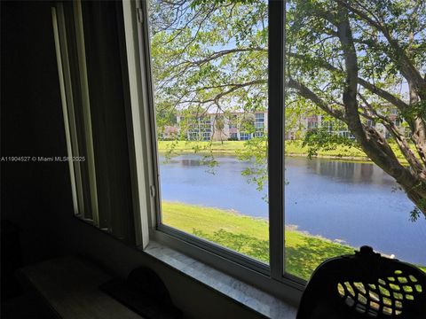 Photo of 1103 NW 58th Ter #321, Sunrise, FL 33313 (MLS # A11904527)