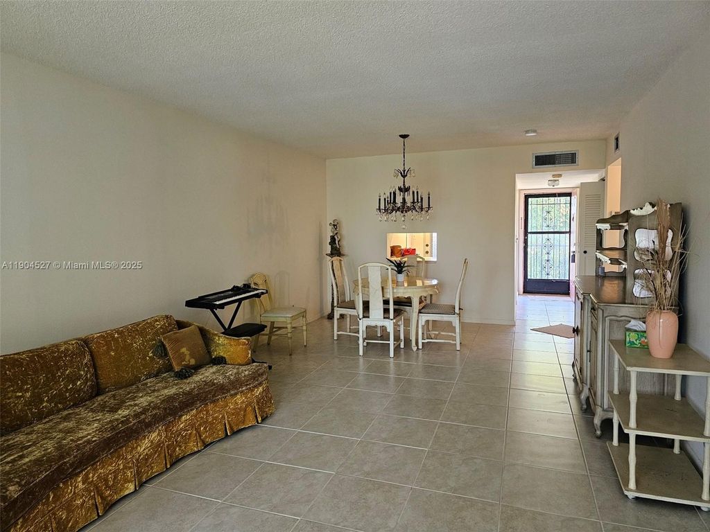Photo of 1103 NW 58th Ter #321, Sunrise, FL 33313 (MLS # A11904527)