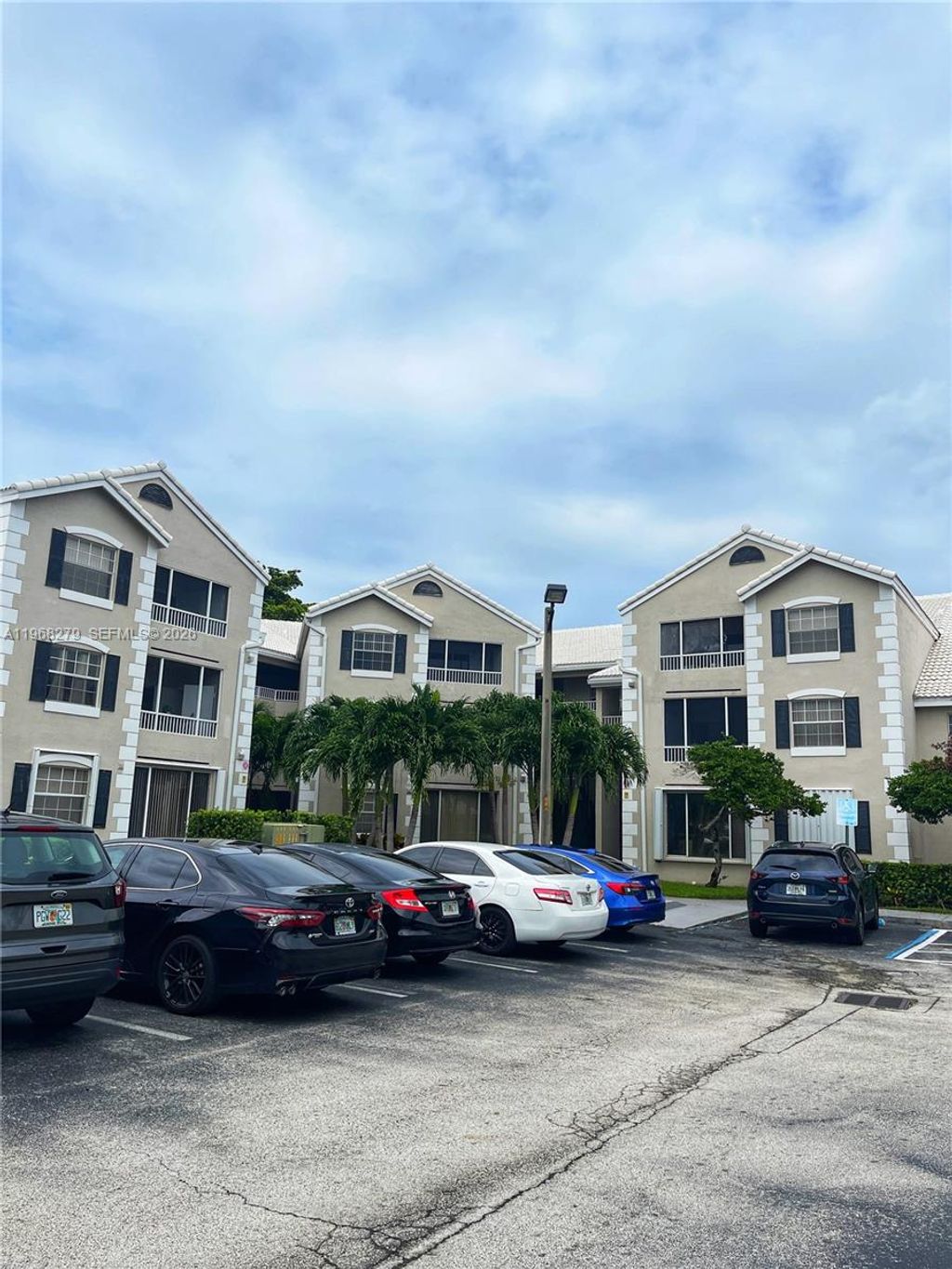 Photo of 2881 N Oakland Forest Dr #208, Oakland Park, FL 33309 (MLS # A11968279)