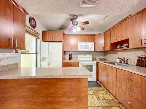 Photo of 11533 NW 10th St #11533, Pembroke Pines, FL 33026 (MLS # A11847776)