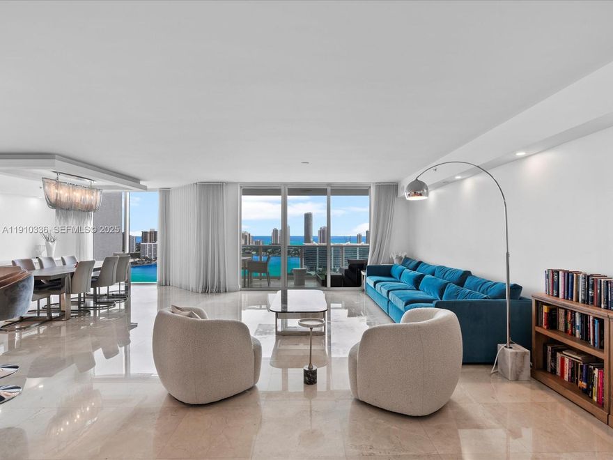 Commanding the skyline of Aventura, this Peninsula II penthouse redefines elevated living with sweeping ocean & bay views. This elegant 4-bedroom, 4.5-bath + den residence showcases a newly reimagined open kitchen with premium finishes, marble flooring, soaring 9-ft ceilings, & floor-to-ceiling windows that bathe the interiors in natural light. Additional features include three garage parking spaces, all-new LED lighting & fixtures, new washer & dryer, & designer furnishings available for purchase. Enjoy world-class amenities including 24-hour security & concierge, resort-style pool & spa, two fitness centers, sauna & steam rooms, tennis courts, children’s playroom, BBQ & lounge areas, & complimentary valet. Ideally located near Aventura Mall, fine dining, & pristine beaches.