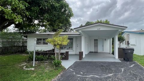 Photo of 4177 NW 52nd Ave, Lauderdale Lakes, FL 33319 (MLS # A12027104)