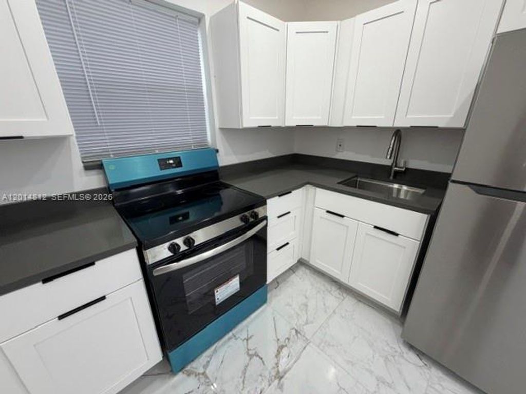 Photo of 1909 Plunkett St #1-4, Hollywood, FL 33020 (MLS # A12014812)