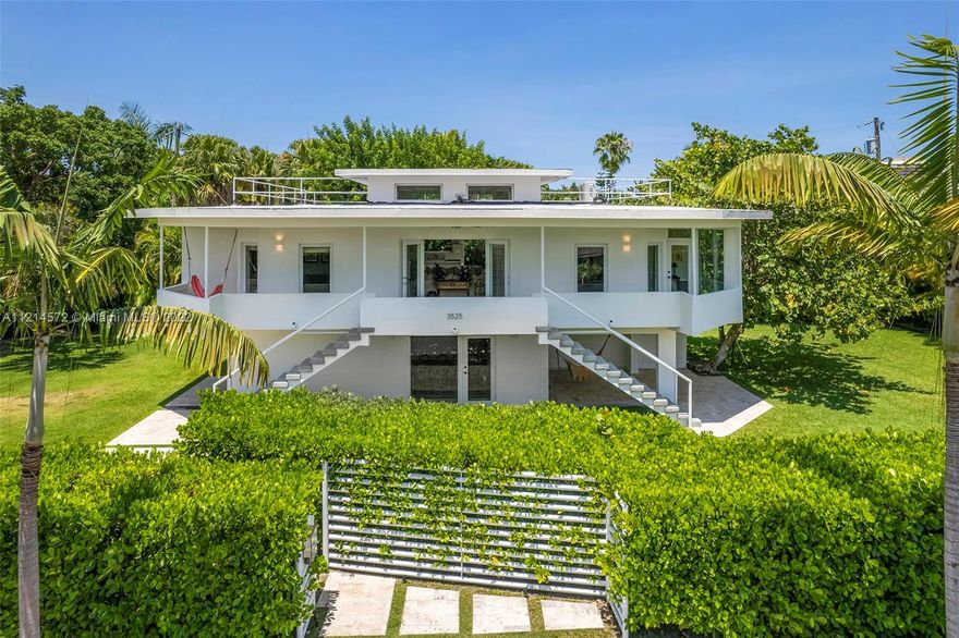 Double lot located in one of the best streets of beautiful and charming North Grove (Lot 6 & 7) with 11.600 Sq Ft.  This home is located in a high demand neighborhood which offers luxury and privacy with a road that ends on the ocean.  This two story home offers 4,300 Sq Ft of construction with 3,600 Sq Ft under A/C …  offering a concrete roof, impact windows throughout, 5 bedrooms, 4 bathrooms, 4 parking spaces, surround system throughout the entire house and a gorgeous back yard and terrace which is perfect for family life and entertaining.  Easy to show.