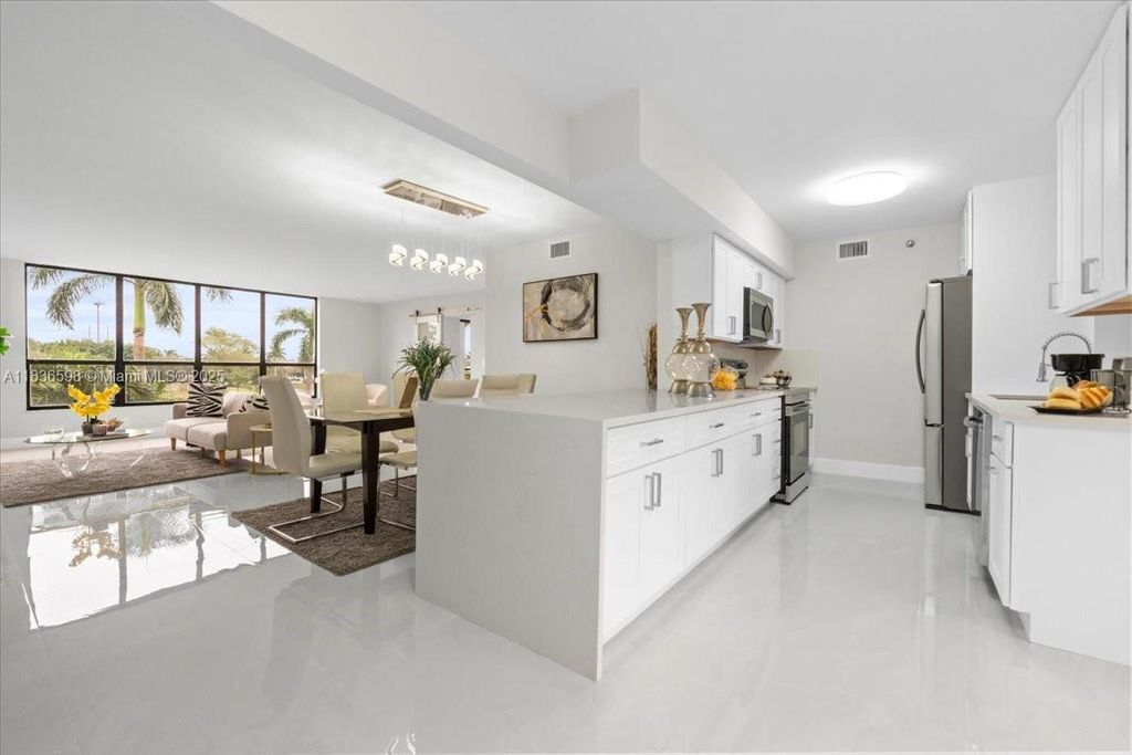 Photo of 7153 Promenade Dr #302, Boca Raton, FL 33433 (MLS # A11836598)