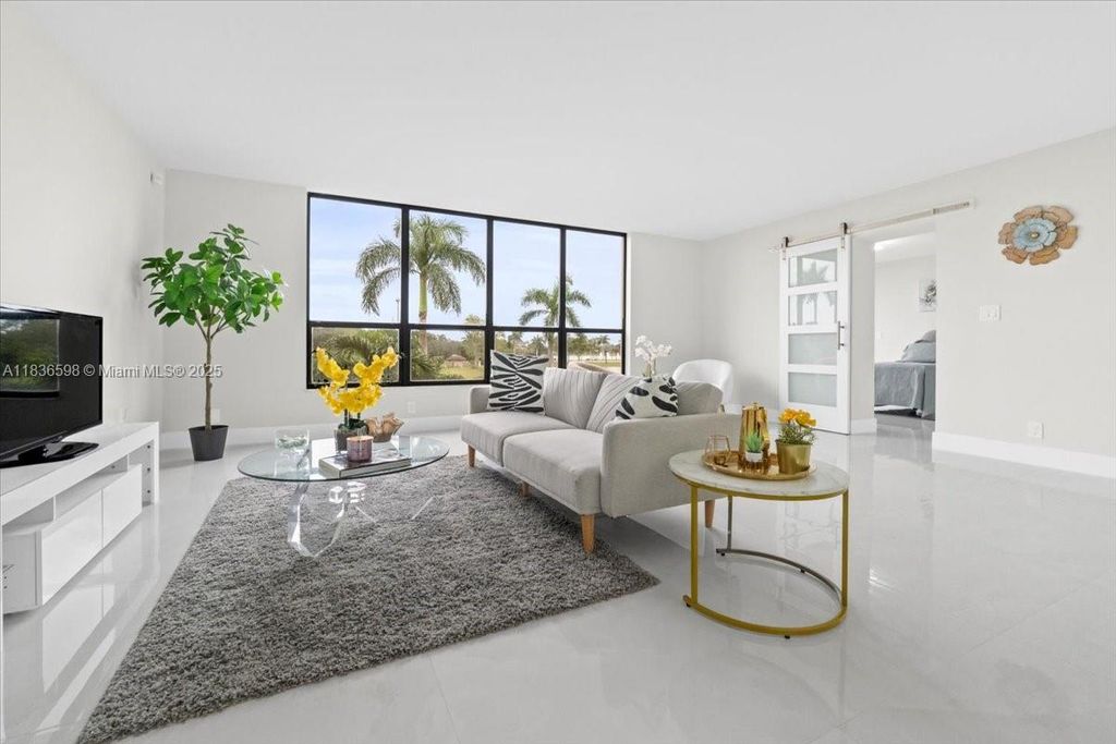 Photo of 7153 Promenade Dr #302, Boca Raton, FL 33433 (MLS # A11836598)