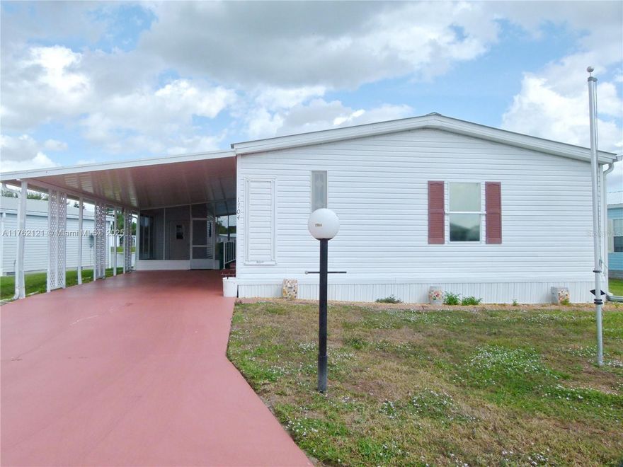 SEMINOLE COVE – 55+ ACTIVE COMMUNITY! ?? This stunning 3-bedroom, 2-bath double-wide manufactured home offers modern comforts and a peaceful setting. Designed with an open-concept layout, this home provides plenty of natural light and ample cabinet storage throughout. ? Key Features: ?? Brand-new A/C (2024) for year-round comfort ?? Durable metal roof for long-lasting protection ?? Beautiful paver walkway surrounding the home ?? Serene pond views – perfect for relaxation Located in the highly desirable Seminole Cove, a vibrant 55+ community, you'll enjoy access to activities, friendly neighbors, and all the conveniences of town just minutes away. Don't miss this opportunity—schedule your showing today!