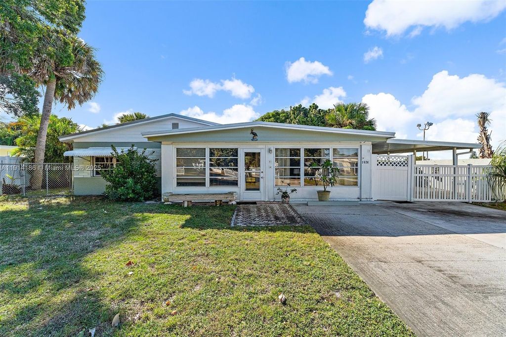 Photo of 1624 NE Orion St, Jensen Beach, FL 34957 (MLS # A11914186)