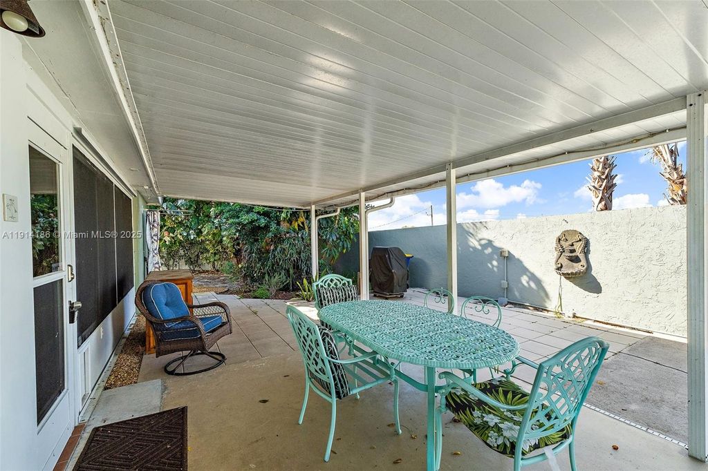 Photo of 1624 NE Orion St, Jensen Beach, FL 34957 (MLS # A11914186)