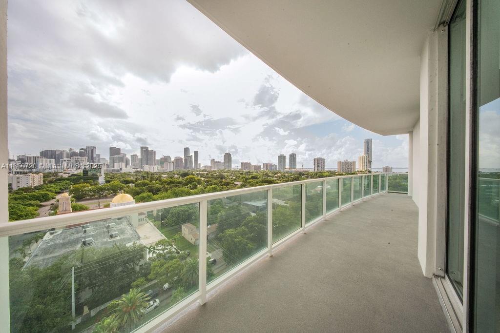 SPECTACULAR UNIT WITH UNINTERRUPTED VIEW TO BRICKELL'S SKYLINE. This 2 bedroom spacious corner unit offers views east and north with the best seat in the house. A spectacular view of all of Miami's downtown skyline, clean, simple and elegant. The unit comes with 3 assigned parking space which is a true rare finding. BOCA Restaurant is located on the first floor for your convenience. The unit is vacant and ready for showings.