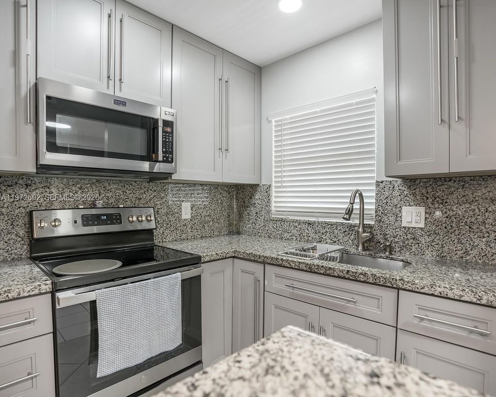 Photo of 9001 Sunrise Lakes Blvd #301, Sunrise, FL 33322 (MLS # A11972602)