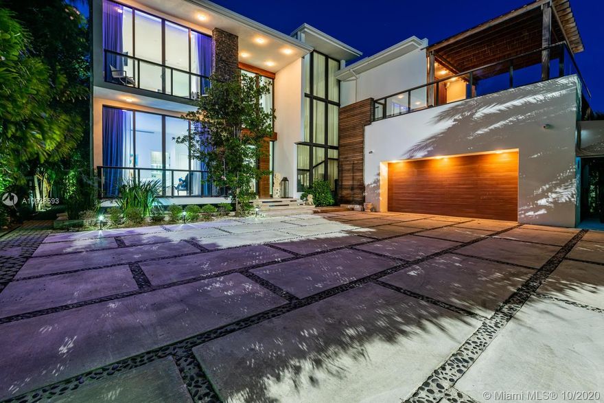 MODERN COMFORT MEETS RESORT-STYLE SANCTUARY. Designed by Cheoff Levy Fischman and built in 2016, this luxe waterfront masterpiece is perfectly nestled across from Miami Beach Golf Club with 80 ft on Biscayne Waterway. This breathtaking spacious, light-filled home reveals clever, multi-faceted design with seamless indoor-outdoor living and intimate privacy throughout. Features: Lutron Homework Lighting; 28 ft living room ceiling; gourmet Subzero-Wolf marble kitchen; 12 person dining room; wide-planked French oak flooring; stunning owner’s suite with full marble slab finishes; and parking for 12 cars with a 4-car AC garage. An entertainer’s delight with outdoor terraces, covered open air summer kitchen, lush pool, cabana bath and rooftop hot tub to savor spectacular sunrises and sunsets!