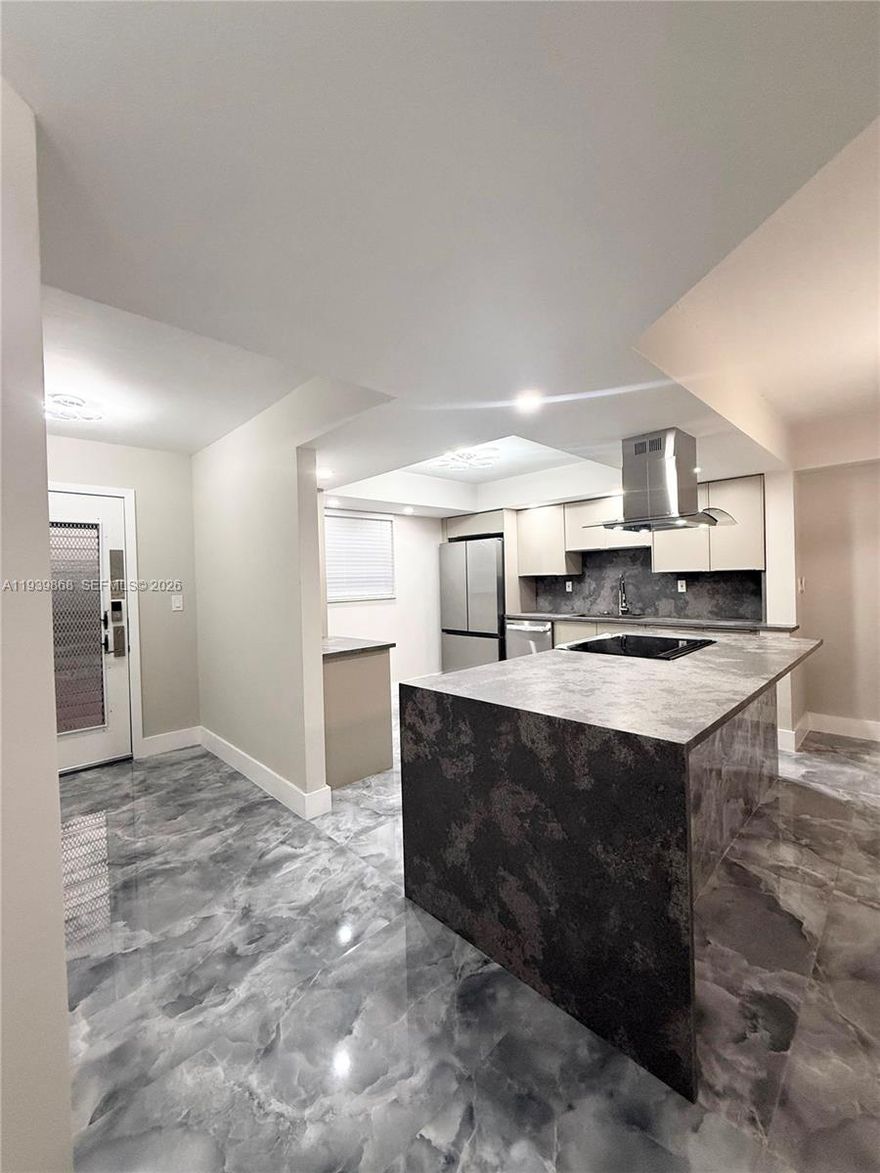 STUNNING HOME IN THE HEART OF TAMARAC. NEW ROOF NEW ELEVATOR ALL CERTIFICATIONS PASSED! 55+ CABLE INSURANCE AND INTERNET ARE INCLUDED. RETIRE IN STYLE. NEW STAINLESS STEEL APPLIANCES HAVE 2 YEAR WARRANTY. CUSTOM QUARTZ COUNTER TOPS WITH AN OPEN FLOOR PLAN AND COOKING ISLAND AWAIT ALL OF YOUR FABULOUS MEALS AND GATHERINGS. CUSTOM GORGEOUS TILE THROUGHOUT FRESHLY REMODELED HOME WITH FROSTED GLASS DOORS AS YOU WALK INTO EVERY AMAZINGLY LIT ROOM. SPACIOUS DEDICATED LAUNDRY ROOM WITH PLENTY OF STORAGE. SPA BATHROOMS WITH MODERN TOUCHES SUCH AS COLORFUL FUN WATER TEMPERATURE INDICATION! IT ALSO HAS BEAUTIFUL LAKE VIEWS. EVERYTHING IN THIS HOME IS SMART (LIKE IT'S FUTURE OWNER) FROM THE KITCHEN APPLIANCES TO THE LOCKS ON THE DOOR! THERE ARE SOME GREAT AMENITIES AS WELL PICKLE BALL GYM AND POOL!