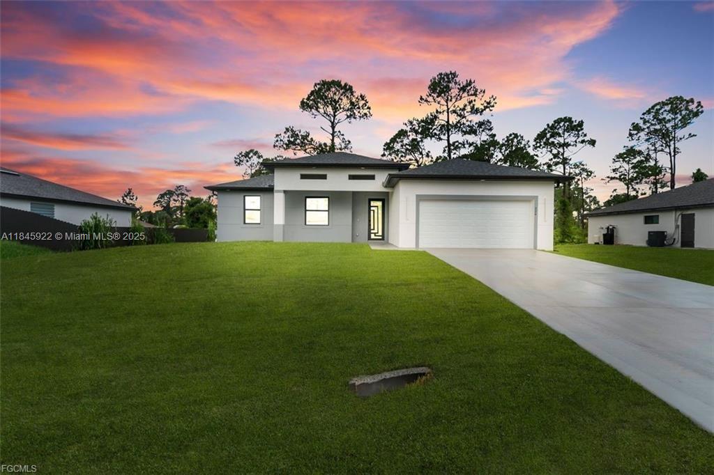 Introducing a luxurious new construction nestled in the heart of Lehigh Acres: a stunning sanctuary on 224 Lomax Ave S that blends modern elegance with comfort, perfect for first-time homebuyers. This exquisite 3+Den, 3-bathroom house spans a generous 1,714 sqft, designed to cater to those who crave both space and sophistication----> REFER TO SUPPLEMENTAL REMARKS FOR COMPLETE DESCRIPTION!