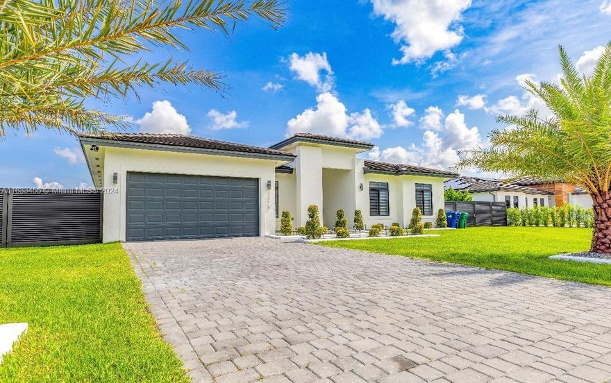 Welcome home! Built in 2020, these 4 bedrooms and 3 1/2-bathroom home is located in a recently developed neighborhood. Features an open floor plan with high ceilings, a spacious master bedroom with large walk-in closets and end-suite bathroom, appointed formal dining area, formal living area, and a large family room illuminated by natural light by the set of French impact doors. Sitting on over 14,000 sq/ft, the home is accented by a covered patio area which is perfect for entertaining. Chic landscaping complements the front of the home highlighted by tropical palms. Ample room is available for boat/RV parking.