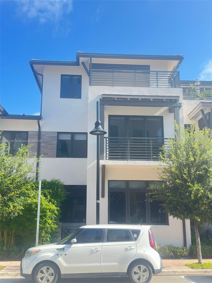 Beautiful 3-story townhouse in Canarias at Downtown Doral. Featuring 4 bedrooms, 3.5 baths, open kitchen with quartz countertops, impact windows/doors, modern stair railing, spacious terrace for entertaining, 2-car garage & laundry room. Excellent location close to highways, shops & A+ schools.