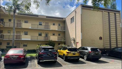 Photo of 100 Ashbury Rd #305, Hollywood, FL 33024 (MLS # A11980062)