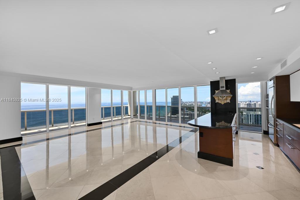 Experience luxury living in this spectacular Lower Penthouse at the exclusive Beach Club Condominium. Featuring 3 bedrooms and 3.5 bathrooms, this apartment boasts the most desirable southeast exposure with panoramic, unobstructed ocean and city views—the best in the entire complex. Enjoy a freshly painted interior, upgraded lighting throughout, and electric shades and blinds in every room. A rare rental opportunity in one of the building’s most sought-after lines.