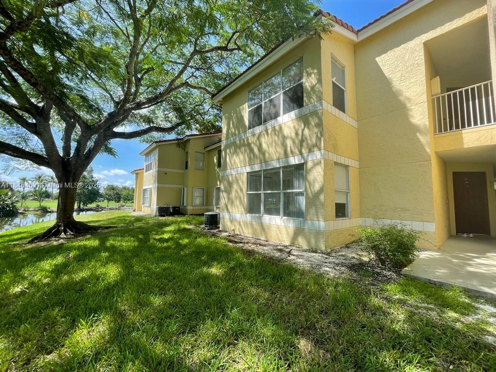 Enjoy the view at the canal and Golf Court, Beautiful 2 bedroom, 1 bathroom. Spacious living/dining area. Washer/Dryer in unit. Amenities include 2 resort-style pools, 24 hour exercise facility. 2 full sized tennis courts, 2 racket ball close to Saw grass Mills, Mall shopping & restaurants.