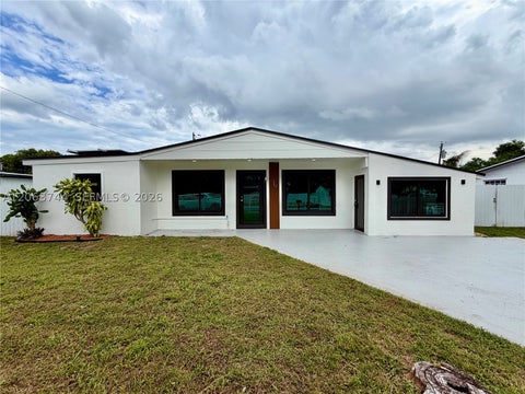 Photo of 2310 NW 208th St, Miami Gardens, FL 33056 (MLS # A12063744)