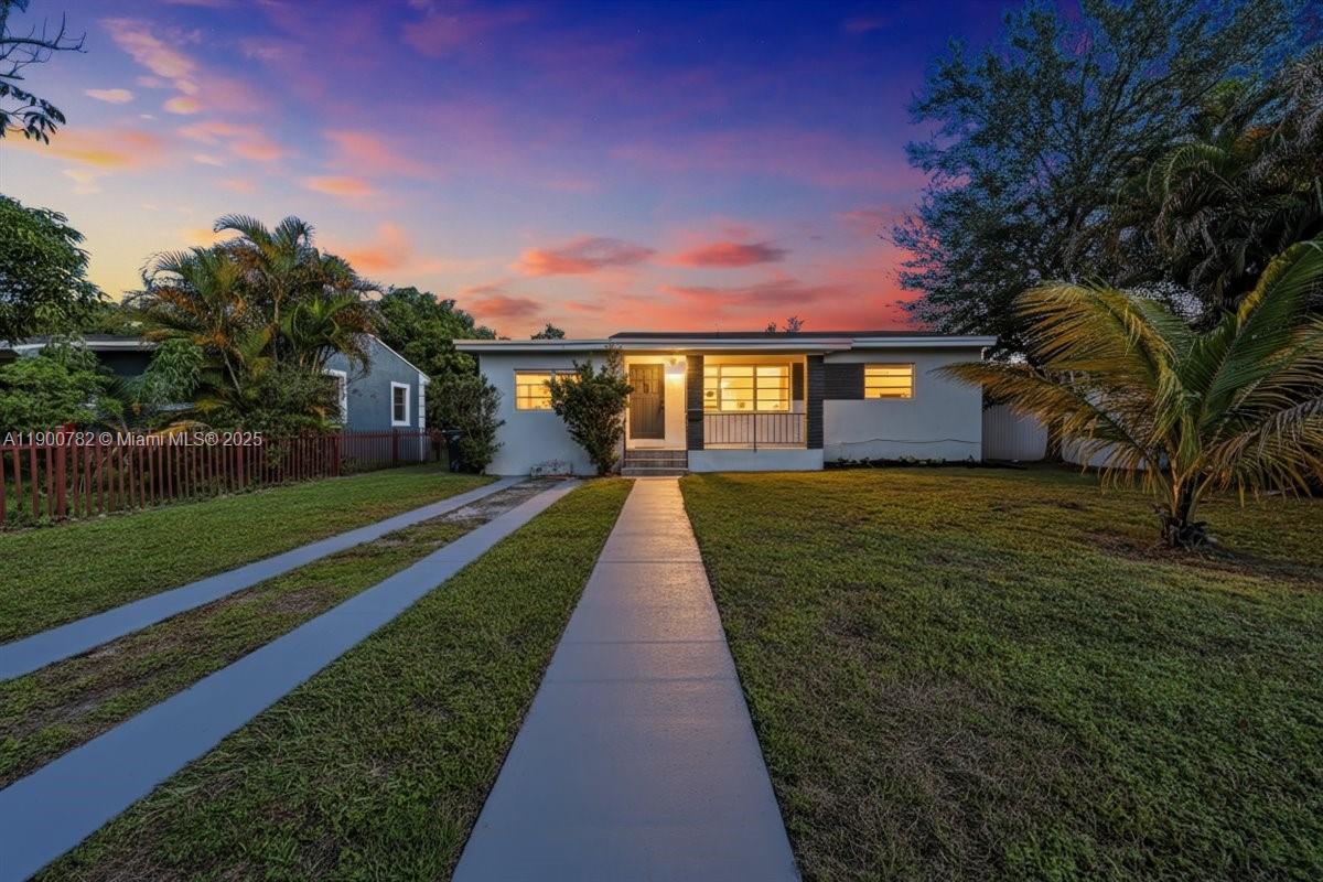 Offers are accepted exclusively through bidding at bit.ly/1245NorthMiami. An excellent opportunity for investors or first-time homeowners! This charming North Miami home features 3 bedrooms and 2 bathrooms with neutral-colored walls, ceilings, and flooring, creating a move-in-ready and versatile space. Recent upgrades include new air ducts and vents (2025), HVAC serviced and coils cleaned (2025), and a roof about 2 years old. The home offers a spacious family room, laundry area, wine cabinet, and a welcoming patio and porch. The large backyard provides endless possibilities *pool, garden, or expand your outdoor living area*. No HOA, enjoy freedom and flexibility. Located near Miami Dde Collge Nrth Campus, The Shops at Mdtwn, and majr highwys, offers comfort, convenience, and lasting value.
