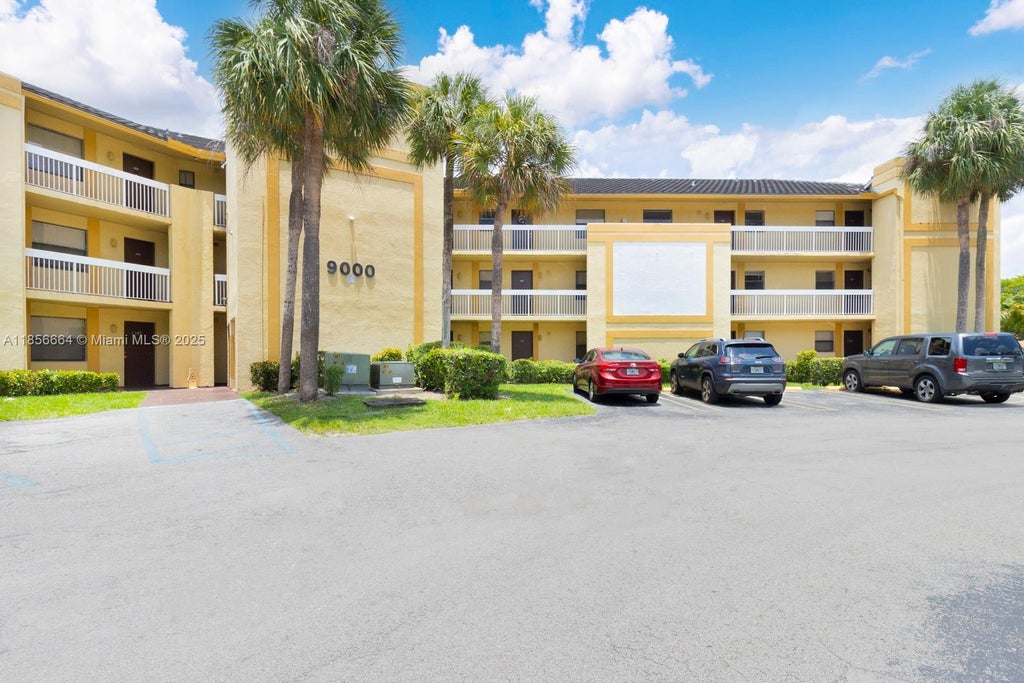 Photo of 9044 NW 28th Dr #3-204, Coral Springs, FL 33065 (MLS # A11856664)