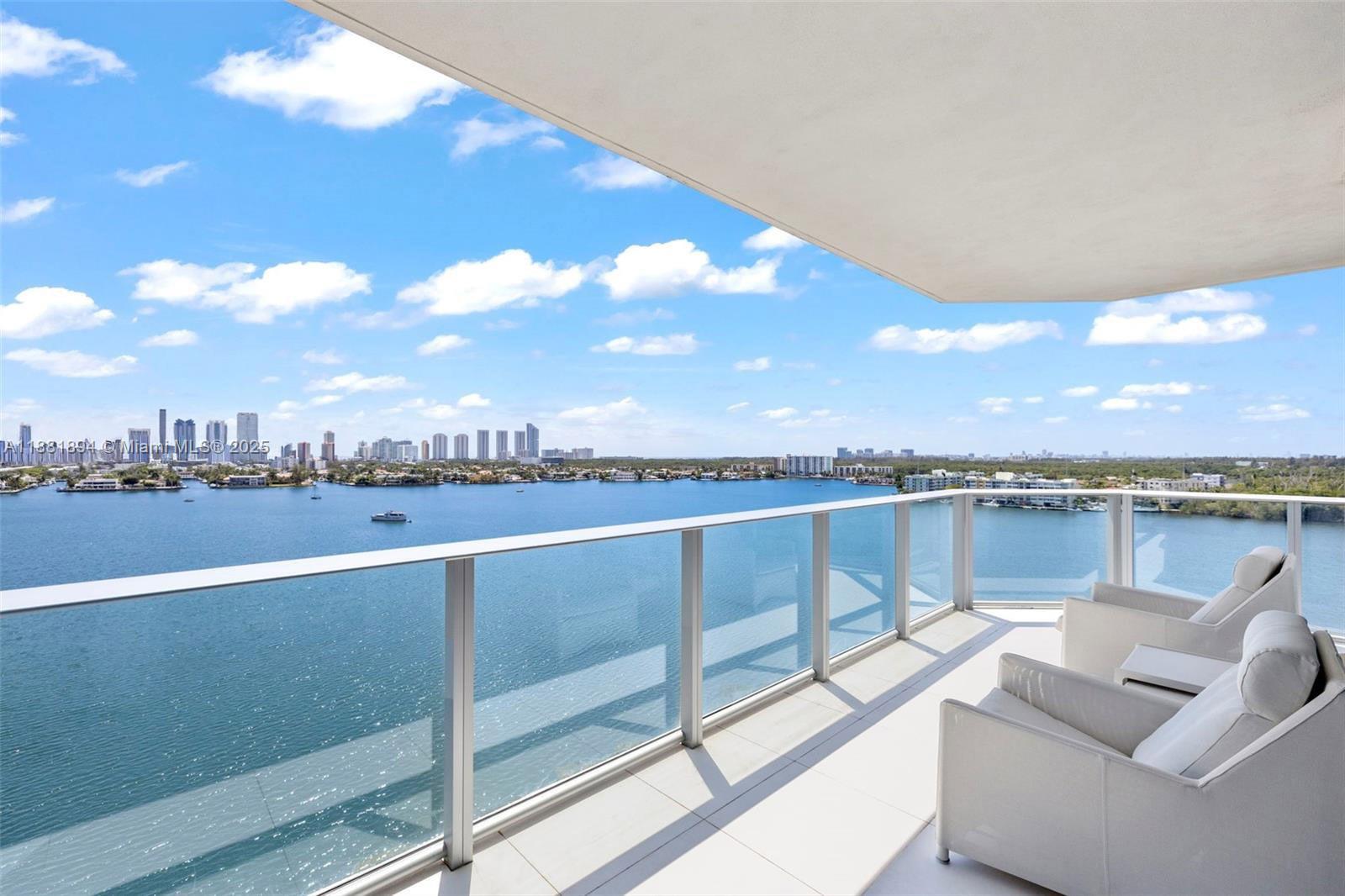 Luxury waterfront living at The Reserve at Marina Palms. This furnished unit offers 3 bedrooms plus a large den and 3.5 baths. Large balcony with endless views of reserve lagoon and skyline. Modern open kitchen with Sub-Zero and Wolf appliances, automated shades, 2 assigned parking spaces and storage. Infinity pool, state-of-the-art gym/spa, valet, concierge, club room, business center, cafe, billiard, children and dog parks. Private boat slips from 40’ to 120’ available for sale or rent thru the Marina. Two parking spaces 259 and 261, storage 4-034