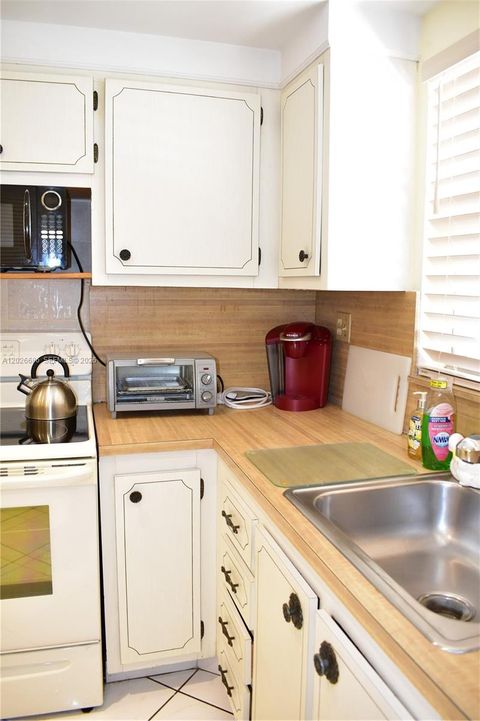 Tiny photo for 9461 Sunrise Lakes Blvd #103, Sunrise, FL 33322 (MLS # A12026686)