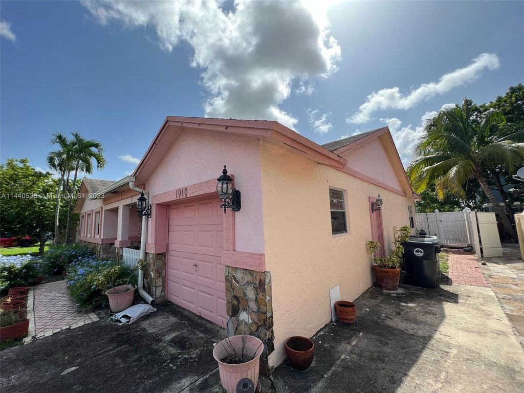 Photo of 1910 SW 86th Ave, North Lauderdale, FL 33068 (MLS # A11440528)