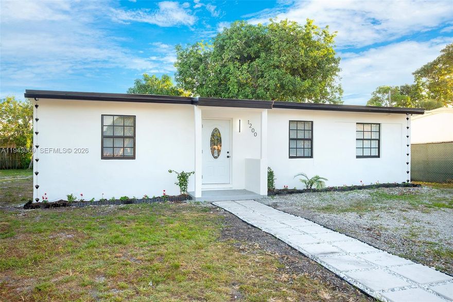 Absolutely stunning 4-bedroom, 2-bath with BRAND NEW ROOF 2025 in the wonderful Neighberhood of Fort Lauderdale 33311. This home offers a thoughtfully designed split floor plan, behaving as a DUPLEX only by locking one door you'll have a completly private 1-bedroom, 1-bathroom unit with PRIVATE ENTRANCE, GREAT AIRBNB/RENTAL OPPORTUNITY OR HOME TO MAKE YOUR OWN. This single family home is an AMAZING TOTAL 1,384 SQFT on a large 6,890 SQFT LOT (Room for Pool). The interior features include ELEGANT laminated WATTER RESISTANT FLOORS throughout, a brand-new kitchen with granite countertops, stainless steel appliances (5-year warranty) and hurricane IMPACT DOORS, showcasing high standards and attention to detail. Located in an up comming neighborhood, just 5 MINUTES FROM THE BEACHES, DOWTOWN FT LAUDERDALE and LAS OLAS BOULEVARD, this home perfectly blends suburban tranquility with easy access to dining, entertainment, and major attractions. Clear title. No liens. No open permits. No violations. VACANT ON LOCKBOX. EASY TO SHOW