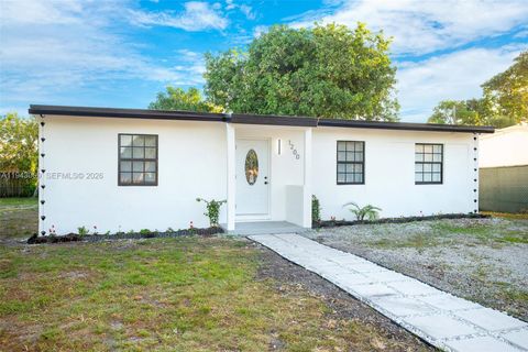 Photo of 1200 NW 11th Ct, Fort Lauderdale, FL 33311 (MLS # A11943069)