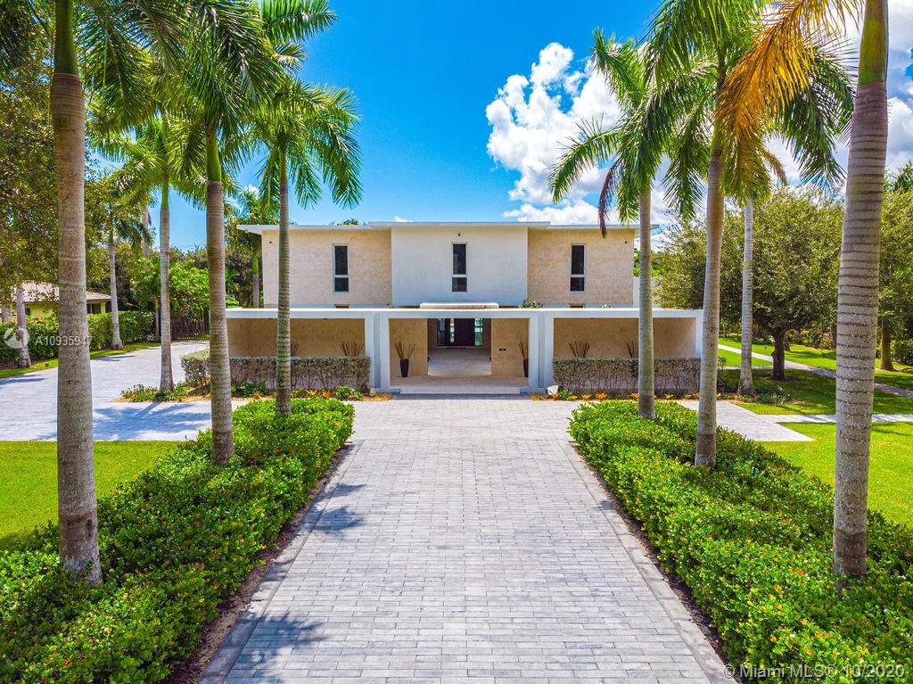 Luxury Modern Estate located in the heart of Pinecrest. It features 7 bedrooms, 7 bathroom and 2 powder. Open layout with full of natural light throughout, double height ceilings, marble floor, walk-in wine cellar. Italian kitchen w/Wolf and Subzero appliances. Impressive backyard and terrace perfect for entertainment with summer kitchen and grill, infinity heated pool, Jacuzzi and guest house. Oversized master suite with an extra large walking closet, incredible bathroom and panic room. 2 laundry rooms, family room, studio overlooking the outdoor area and 4 car garage. Easy access to major expressway and very close to the best schools in the area.