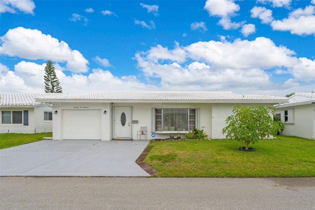 Photo of 7500 NW 66th Ter, Tamarac, FL 33321 (MLS # A11938374)