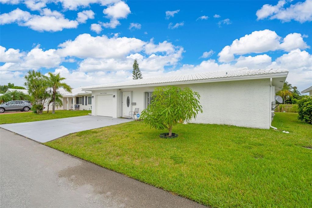 Photo of 7500 NW 66th Ter, Tamarac, FL 33321 (MLS # A11938374)