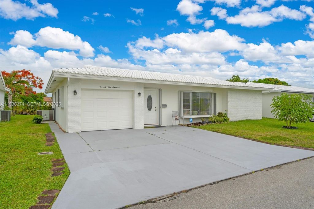 Photo of 7500 NW 66th Ter, Tamarac, FL 33321 (MLS # A11938374)