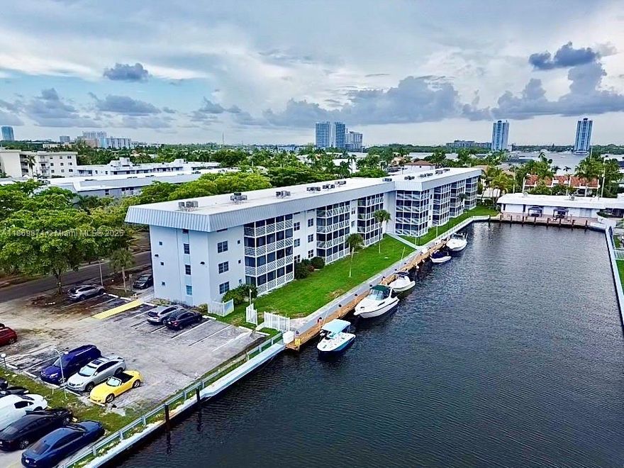 Boat-lover's retreat in ultra-quiet 55+ Eden Isles, canal-front minutes to the ocean. Bright 1BR first-floor garden home with screened balcony facing the Canal and private docks. Elegant new kitchen with wood cabinetry, granite, Bosch dishwasher and a brand-new convection oven/microwave; custom closets, updated High Impact doors and lighting. 2025 A/C with transferable warranty; impact entry (per owner). HOA includes cable, internet and water. Heated pool, clubhouse, gym, billiards and community shuttle. Dockage to rent or buy – bring your boat! Surrounded by ultra-luxury homes and towers with private docks, including Williams Island, Acqualina and the future Intracoastal/Uptown Harbour. 3-D Virtual Tour & floor plan available – call listing agent.