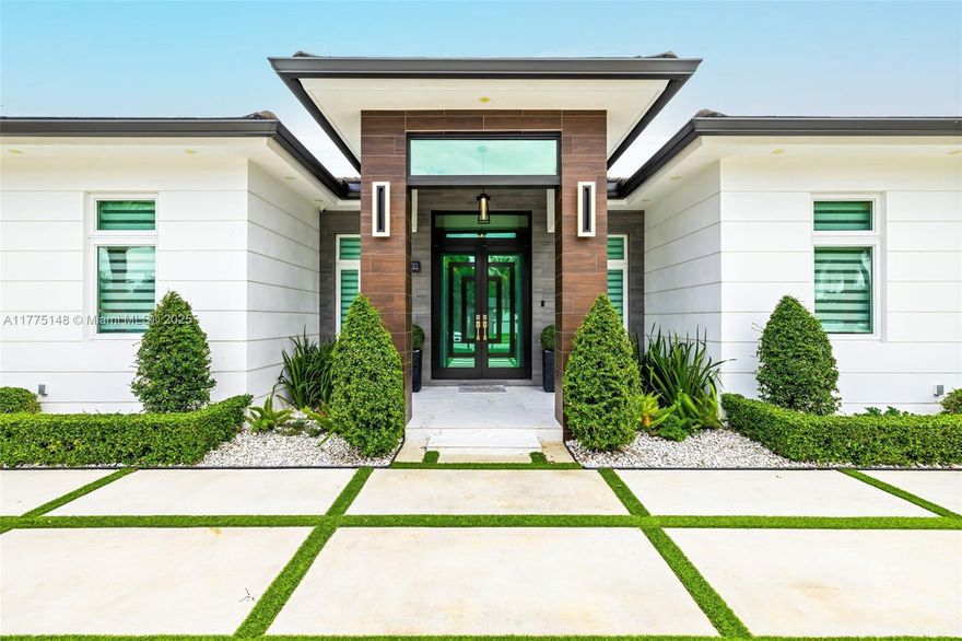 This exceptional property is situated in a coveted neighborhood. On a 24,075 sqft lot, it features 4 bedrooms 4 bathrooms and an extra room that serves as flexible space. Completely remodeled, it boasts 2022 updates to the roof, electric, and plumbing. The interior showcases elegant Spanish porcelain floors and 10.6 ft ceilings, with both indoor and outdoor kitchens adorned with quartzite counters, seamlessly connecting the spaces, and perfect for entertaining. Impact-resistant windows and doors offer security, while LED lighting throughout enhances the home’s bright and vibrant feel. A gas meter powers appliances reducing electricity costs. Additional highlights include two 2020-installed AC units, a security system, and a turbine sprinkler system, ensuring convenience and peace of mind.