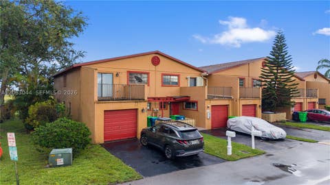 Photo of 2824 NW 80th Ave, Sunrise, FL 33322 (MLS # A12063044)