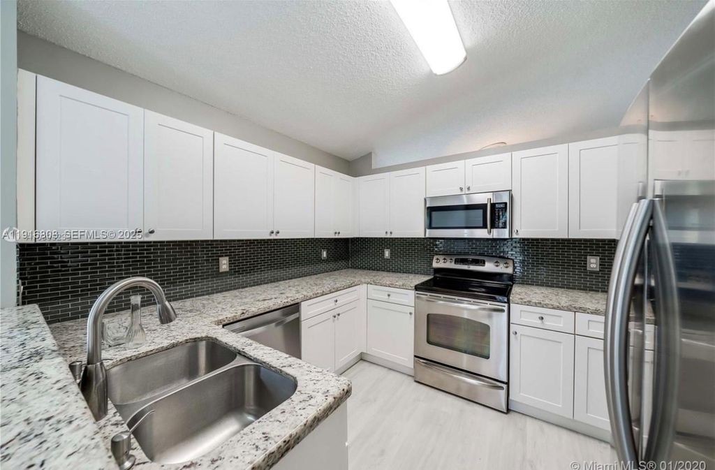 Photo of 20421 SW 1st Street, Pembroke Pines, FL 33029 (MLS # A11916808)