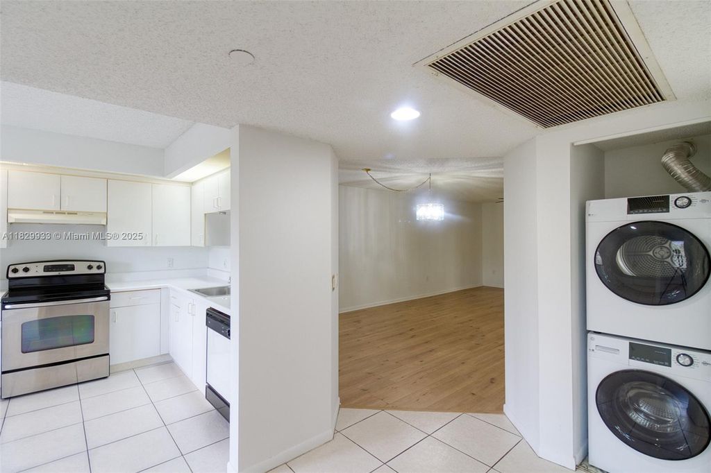 Photo of 571 SW 142nd Ave #209O, Pembroke Pines, FL 33027 (MLS # A11829933)