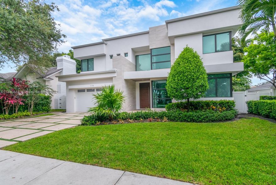 This gorgeous home was build in 2020 and has 5 bed/5 bath contemporary home with 4,150 sq ft of A/C living space on an "oversized" lot in the heart of prestigious Rio Vista. Complete Smart Home includes indoor/outdoor sound system, alarm, cameras, automated window coverings & lighting. Lushly landscaped backyard with heated saltwater pool & spa. Large covered patio with full summer kitchen. Massive great room with Chef's kitchen, huge island, amazing walk- in pantry, wet bar & wine cooler. First floor bedroom en-suite. Stunning floating wood and glass staircase leads to three large bedroom en-suites with walk-in closets, laundry room and a spectacular master bedroom en-suite with two enormous walk-in closets. Energy efficient home includes Generac  generator, LED lighting, gas appliances.