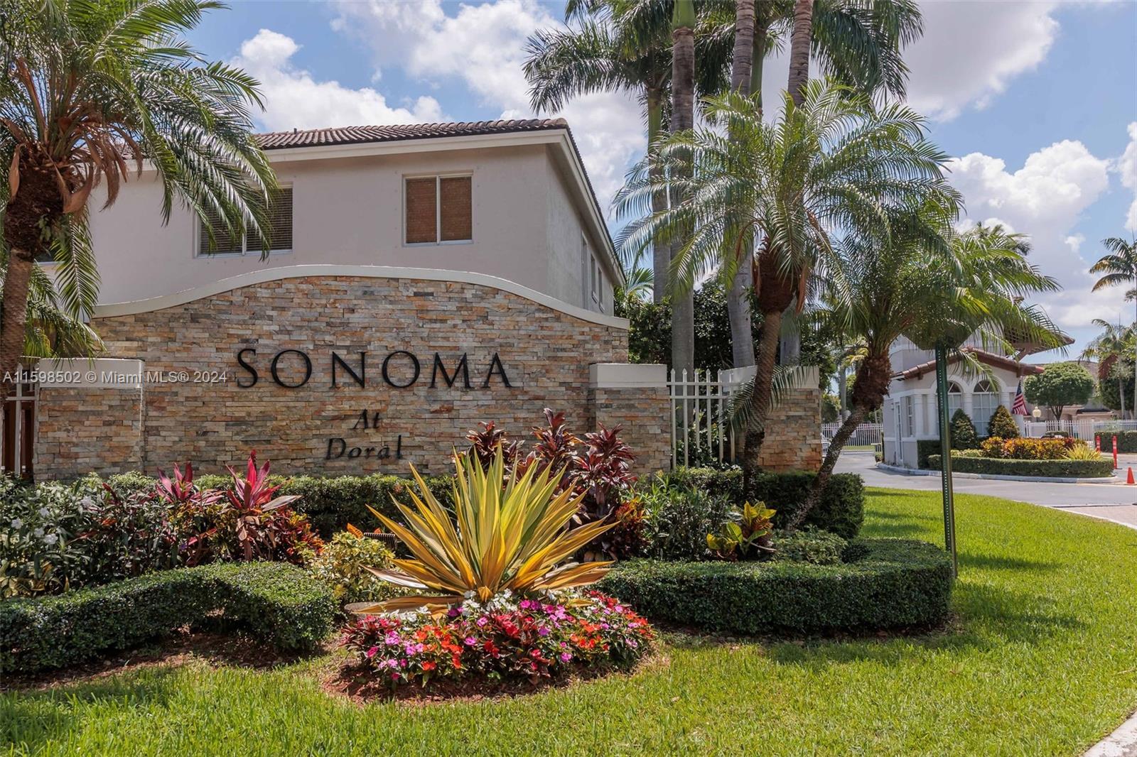 Come take a look at this rare find in Doral! This corner unit townhouse boasts 5 bedrooms, including a den converted to the 5th bedroom. One bedroom with a full bathroom is conveniently located on the ground level. The master bathroom and closet have been updated, as well as the second bathroom on the second floor and the stairs. Enjoy a spacious living room with high ceilings throughout, fully paved backyard perfect for entertaining family and guests. The townhouse comes with 1 attached garage plus you may park 2 additional cars up  font. Guests parking is available in front of the property. The community offers 24/7 guard service, a playground for the family, and beautifully maintained landscaping.  Additionally, the roof will be replaced at the owner's expense. The A/C is 2 years old.