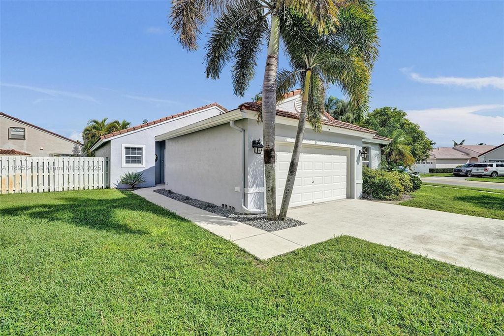 Photo of 18951 NW 10th Ter, Pembroke Pines, FL 33029 (MLS # A11895341)