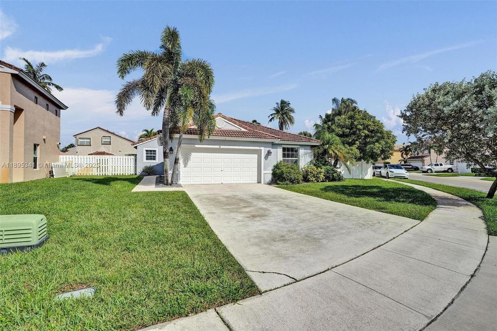 Photo of 18951 NW 10th Ter, Pembroke Pines, FL 33029 (MLS # A11895341)