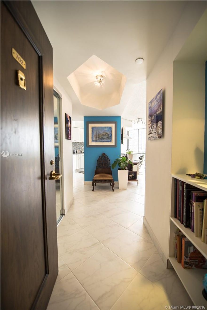 RENOVATED 2/2 WITH NORTH EAST EXPOSURE.  ITALIAN KITCHEN QUARTZ FINISHES. SELF CLOSING DRAWERS & CABINETS. 2 LARGE PANTRY'S, EVERPURE WATER FILTER, HUNTER DOUGLAS WINDOW TREATMENTS, STAINLESS APPLIANCES, TOP OF LINE WASHER & DRYER, TEMPERED GLASS SHOWER DOORS, OCEANIA JACUZZI TUB, BUILT IN CLOSETS, PORCELAIN FLOORS, HURRICANE SHUTTERS, 1 AIR CONDITIONED STORAGE UNIT/2 BIKE RACKS, 2 PARKING SPACES.  BUILDING RENOVATED, ASSESSMENT PAID IN FULL.