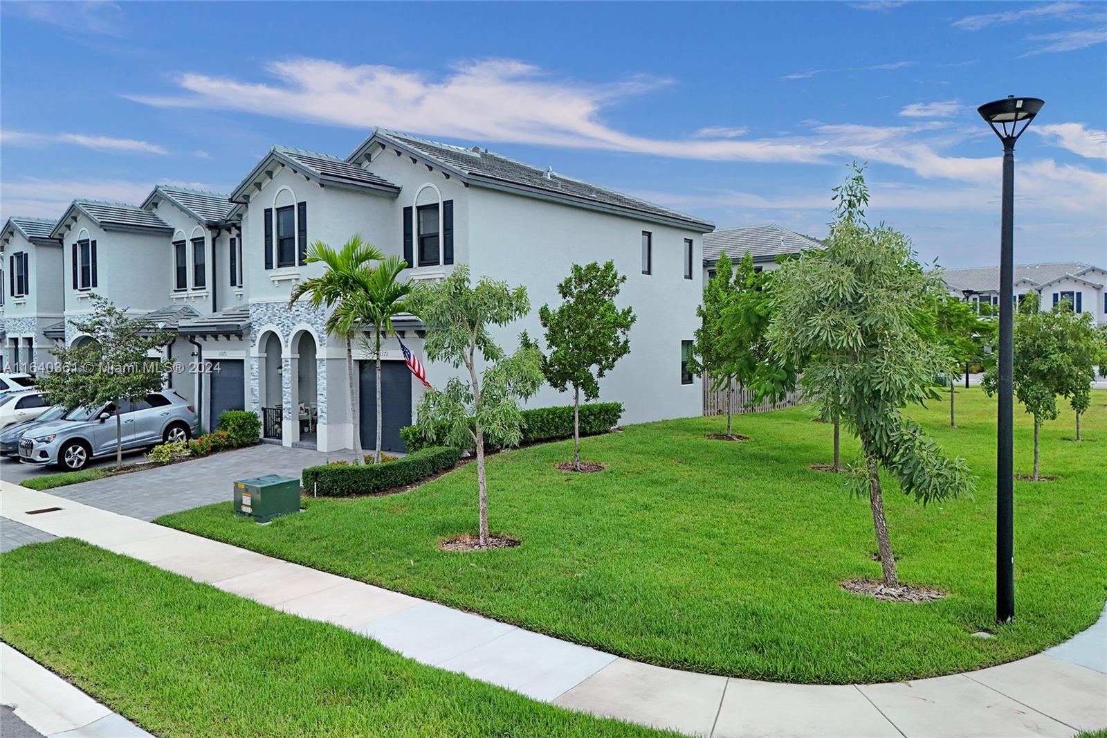 SELLER CAN ASSIST WITH BUYERS CLOSING COSTS!! Welcome to this beautiful newer construction townhome! Largest corner lot in the community. 1,820 sqft provides a spacious & comfortable 4/2.5 lay out. Impact windows & doors. Smart home with ring security system. Brand-new luxury vinyl floors on the 1st floor. As you walk in, you are greeted by the impressive high ceilings & formal living room. The kitchen is equipped with gorgeous stainless-steel appliances. Dining/family room adjacent to each other to create delightful family memories. Fenced in backyard. 1 car garage for vehicle/storage. Space in front of the home for 2 other cars. Come tour this gem before it's gone! PLEASE NOTE there is 2nd loan for impact windows/doors that will be paid at closing & will bring taxes down to $6,059.