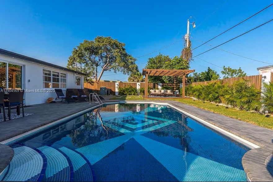 Discover this fully renovated tropical retreat!  This stunning 4-bedroom, 2-bath home features a sparkling pool, lush gardens, and a spacious patio perfect for entertaining. Enjoy peace of mind with a new roof, hurricane-impact windows and doors, and designer upgrades throughout — from the modern kitchen to the elegant bathrooms with a custom double shower. Ideally located close to shopping, top-rated schools, dining, and major highways. A rare opportunity to live in style and comfort in beautiful Palm Beach County!